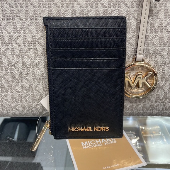 MICHAEL KORS
Jet Set Travel Medium Top Zip Leather Card Case Wallet
Black
NWT - Picture 12 of 16